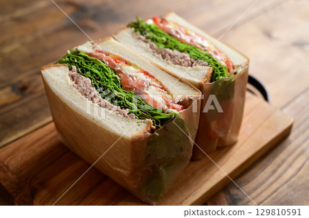 Marinated salmon and tuna sandwich Marinated salmon and tuna sandwich 129810591