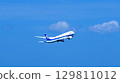 An ANA plane takes off into the blue sky 129811012