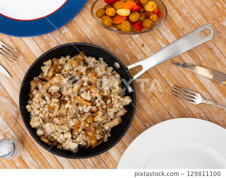 Pearl barley with fried pieces of lard Pearl barley with fried pieces of lard 129811100