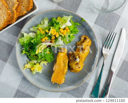 Roast chicken and mixed vegetable salad with canned corns Roast chicken and mixed vegetable salad with canned corns 129811180