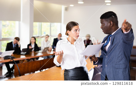 Angry director kicks delinquent female manager out of meeting room Angry director kicks delinquent female manager out of meeting room 129811618