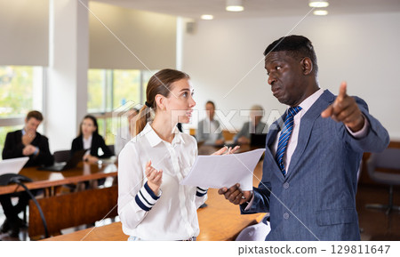 Angry director kicks delinquent female manager out of meeting room 129811647