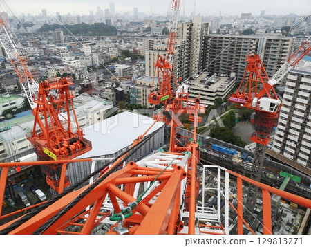 Tower crane on construction site 129813271