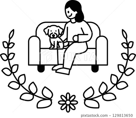 A woman sits on a couch with a dog on her lap 129813650