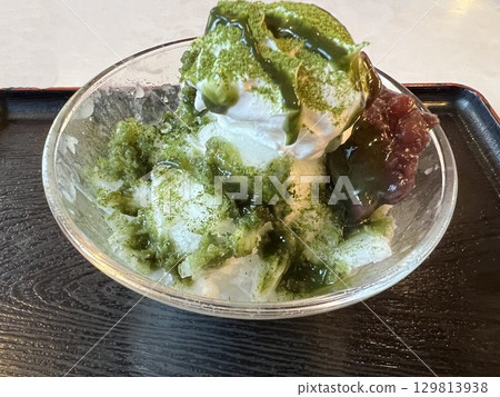 Shaved ice topped with matcha, soft serve ice cream, and red bean paste Shaved ice topped with matcha, soft serve ice cream, and red bean paste 129813938