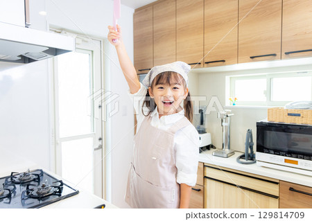 Kitchen kids cooking 129814709