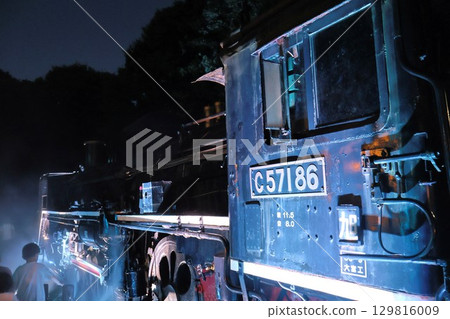 Night view of the steam locomotive exhibition hall in the park Night view of the steam locomotive exhibition hall in the park 129816009