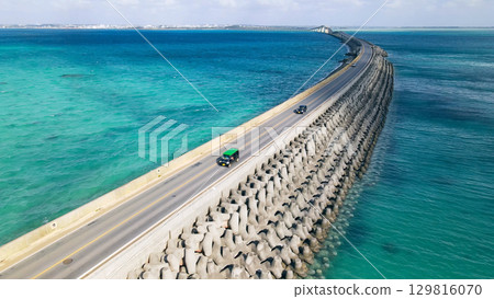 Drone aerial shot of a tropical road crossing the ocean Drone aerial shot of a tropical road crossing the ocean 129816070
