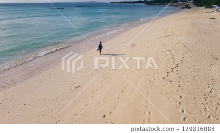 Drone aerial shot of a tropical beach 129816083