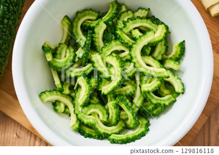 Cut bitter melon in a bowl | Cooking process and preparation image Cut bitter melon in a bowl | Cooking process and preparation image 129816118