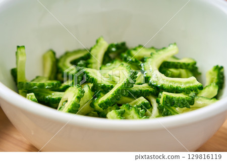 Cut bitter melon in a bowl | Cooking process and preparation image Cut bitter melon in a bowl | Cooking process and preparation image 129816119