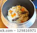 Rice cooked with clams and shiitake mushrooms 129816971