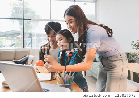 Family spends their free time together 129817572