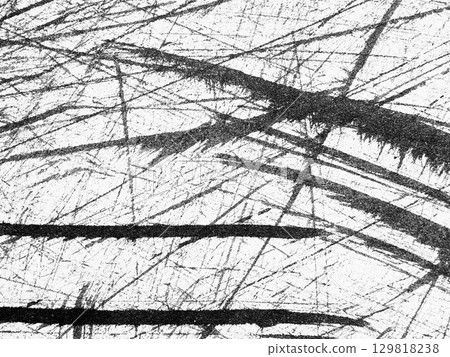 Detailed black and white abstract texture showing intricate lines and scratches created on a surface Detailed black and white abstract texture showing intricate lines and scratches created on a surface 129818238