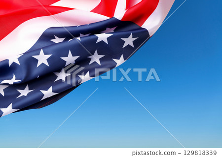 Colorful flags wave proudly in the gentle breeze on labor day 129818339