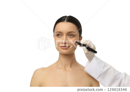 Model receiving facial marking in a beauty studio, isolated on white, PNG Model receiving facial marking in a beauty studio, isolated on white, PNG 129818346