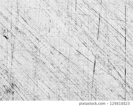 Textured surface with intersecting lines showing wear and scratches from repeated use in a workshop environment 129818823