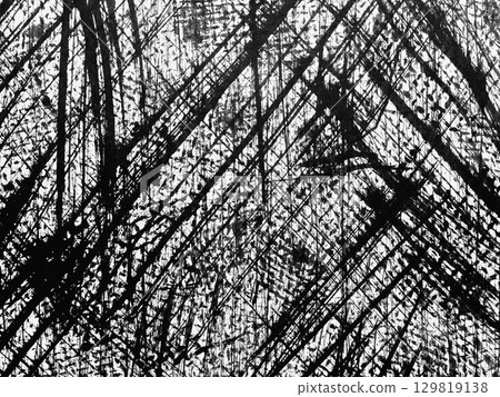 Abstract black and white texture with sharp diagonal lines created through dynamic brush strokes on a canvas surface 129819138