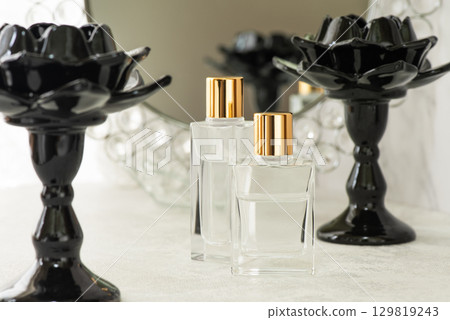 Two luxury glass cosmetic bottles 129819243