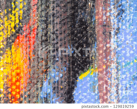 Bright colors and textures blend in abstract artwork displayed at a local gallery on a sunny afternoon Bright colors and textures blend in abstract artwork displayed at a local gallery on a sunny afternoon 129819259