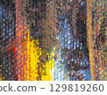 Colorful abstract texture created with vibrant brush strokes and layered paint variations during an artistic session 129819260