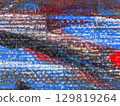 Vibrant abstract painting showcasing dynamic patterns of color and texture in a contemporary art style 129819264