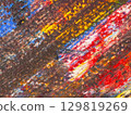 Vibrant abstract artwork showcasing a mixture of colors and textures in a dynamic arrangement 129819269
