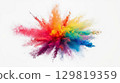 A brilliant explosion of colored powder fills the air, showcasing a stunning array of colors blending and contrasting with each other. The vibrant display exudes energy and creativity 129819359