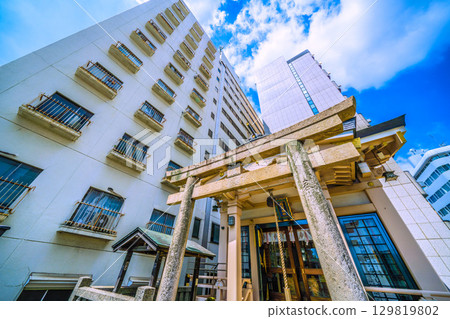 Tokyo cityscape in Japan, including Inari Shrine in front of Takanawa Gateway City 129819802