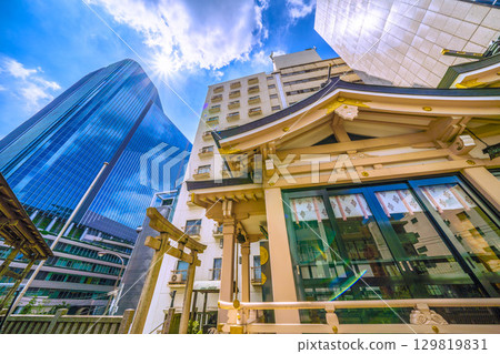 Tokyo cityscape in Japan, including Inari Shrine in front of Takanawa Gateway City 129819831