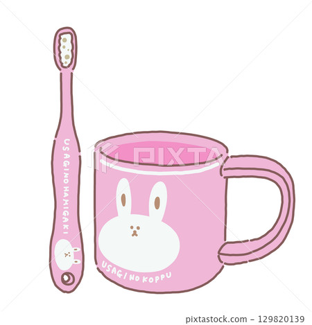 A pink toothbrush and cup set with a rabbit design A pink toothbrush and cup set with a rabbit design 129820139