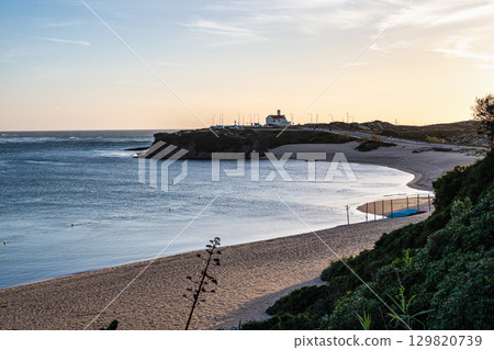 Praia do Farol in Vila Nova de Milfontes, Portugal is located at the mouth of the Mira River on the northern bank. 129820739
