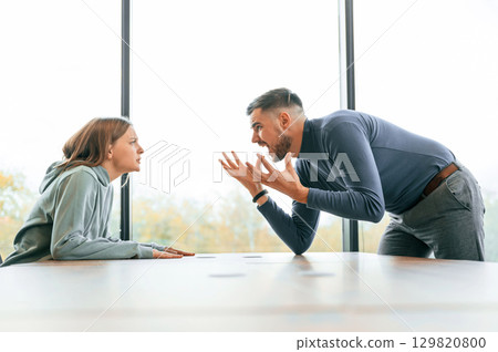 Man is screaming at his girlfriend, conception of quarrel Man is screaming at his girlfriend, conception of quarrel 129820800