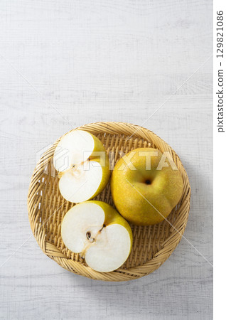 Pear cut in half Pear cut in half 129821086