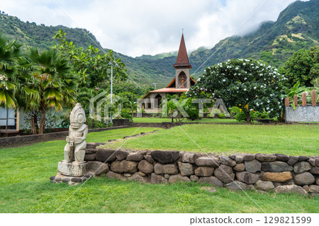 Tiki statue in front of the Vaitahu church, Tahuata, Marquesas Islands, French Polynesia 129821599