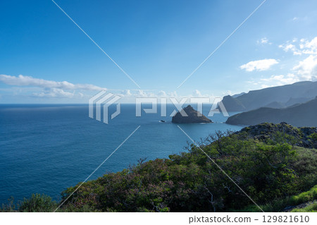 Cliffs and coastline of Taiohae Bay in Nuku Hiva, Marquesas Islands, French Polynesia Cliffs and coastline of Taiohae Bay in Nuku Hiva, Marquesas Islands, French Polynesia 129821610