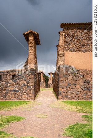 Ancient Ruins of Raqchi in the Peruvian Highlands Under Clouds 129821616
