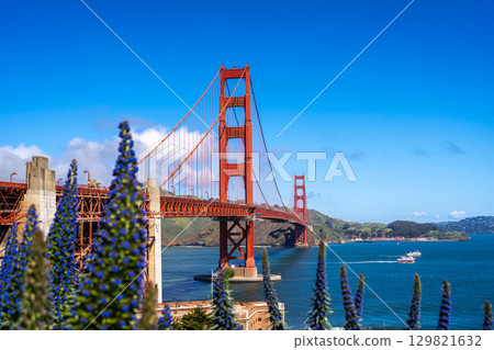 Golden Gate Bridge over blue waters with scenic hills in San Francisco 129821632