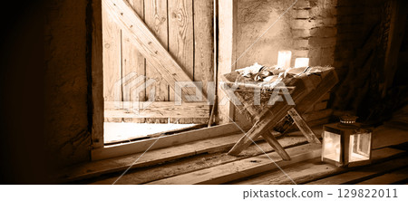 Manger in the barn. Christmas background 129822011