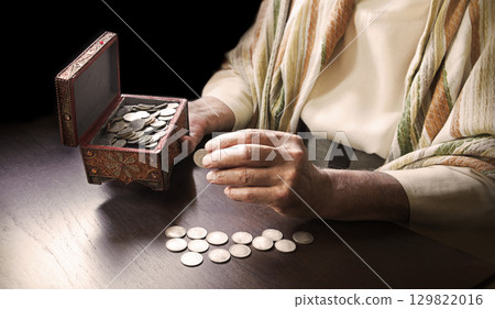 Man with a cash in the box 129822016