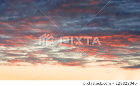 Bright clouds in the evening sky 129822040