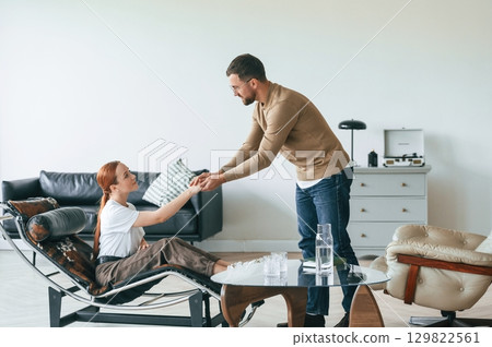 Life problems. Woman is sitting in chair at an appointment with a psychologist 129822561