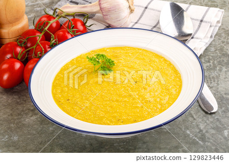 Vegetarian corn cream soup served parsley Vegetarian corn cream soup served parsley 129823446