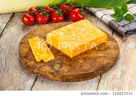 Marble yellow cheese with slices Marble yellow cheese with slices 129823531