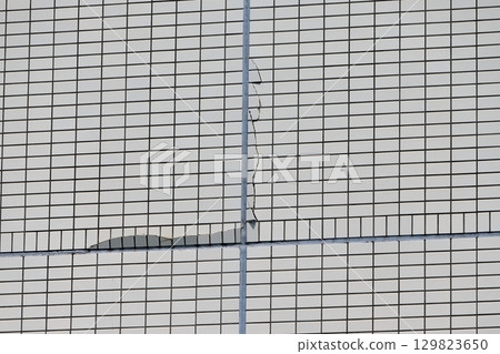 Cracks in the outer wall tiles image Cracks in the outer wall tiles image 129823650