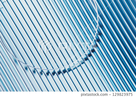 Empty petri dish close-up on blue striped ribbed glass background. Mockup for cosmetic product sample Empty petri dish close-up on blue striped ribbed glass background. Mockup for cosmetic product sample 129823975
