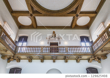 Queens House, Greenwich London. Grand Hall Interior with Balcony and Ornate Ceiling Queens House, Greenwich London. Grand Hall Interior with Balcony and Ornate Ceiling 129825408