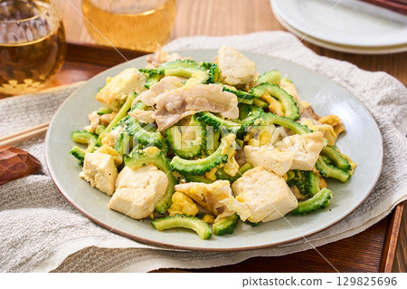 Goya Chanpuru | Okinawan-style stir-fried tofu, eggs, and pork Goya Chanpuru | Okinawan-style stir-fried tofu, eggs, and pork 129825696