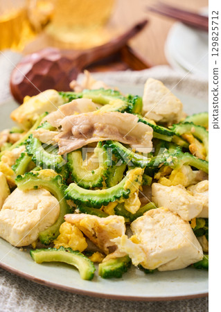 Goya Chanpuru | Okinawan-style stir-fried tofu, eggs, and pork Goya Chanpuru | Okinawan-style stir-fried tofu, eggs, and pork 129825712