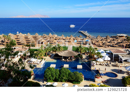 The tourists are on vacation at luxury hotel, Sharm el Sheikh, Egypt. The tourists are on vacation at luxury hotel, Sharm el Sheikh, Egypt. 129825728